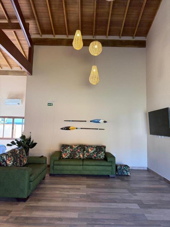 The inn's shared space with a sofa and a television