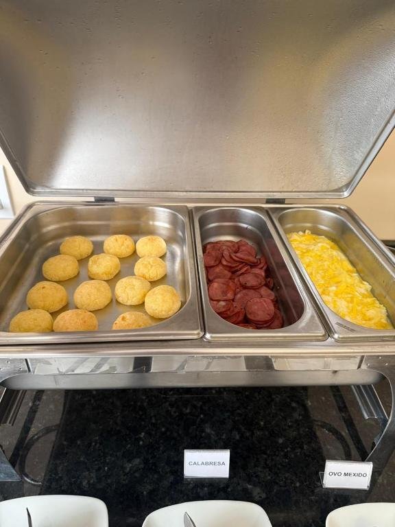Warm savory pastries and breads in the breakfast warmer