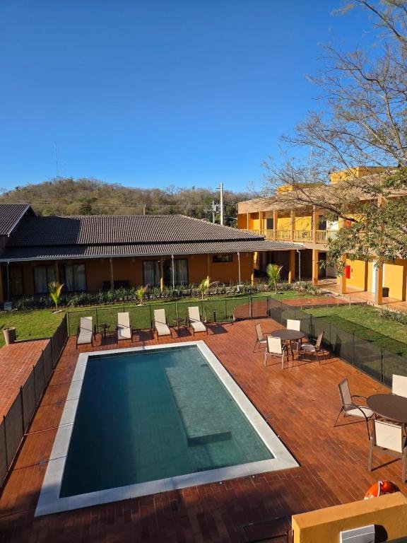 The outdoor pool with hydro jets surrounded by the inn's garden