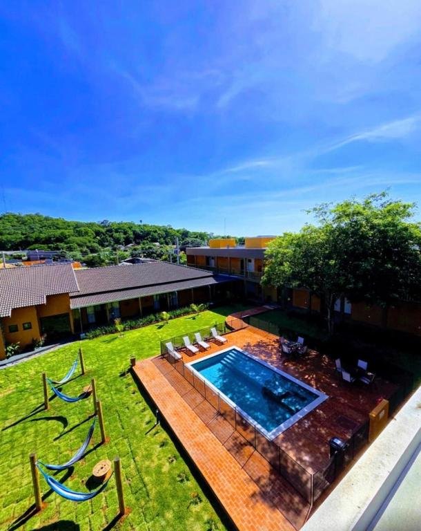 The inn's garden with the pool behind it