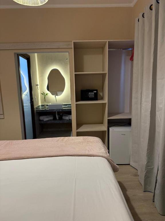 The suite's wardrobe and minibar
